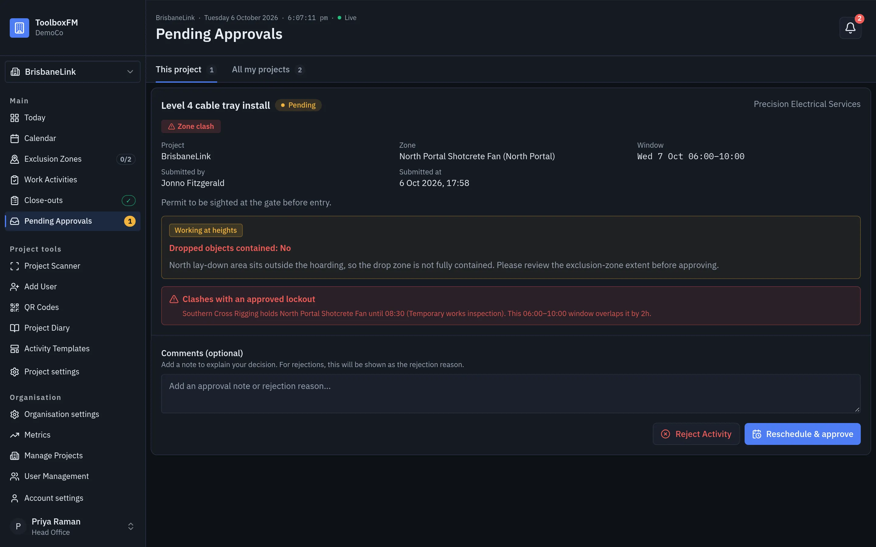 The approvals queue in ToolboxFM, showing a Working at heights request with Dropped objects contained: No, a comment and a clash with an approved lockout
