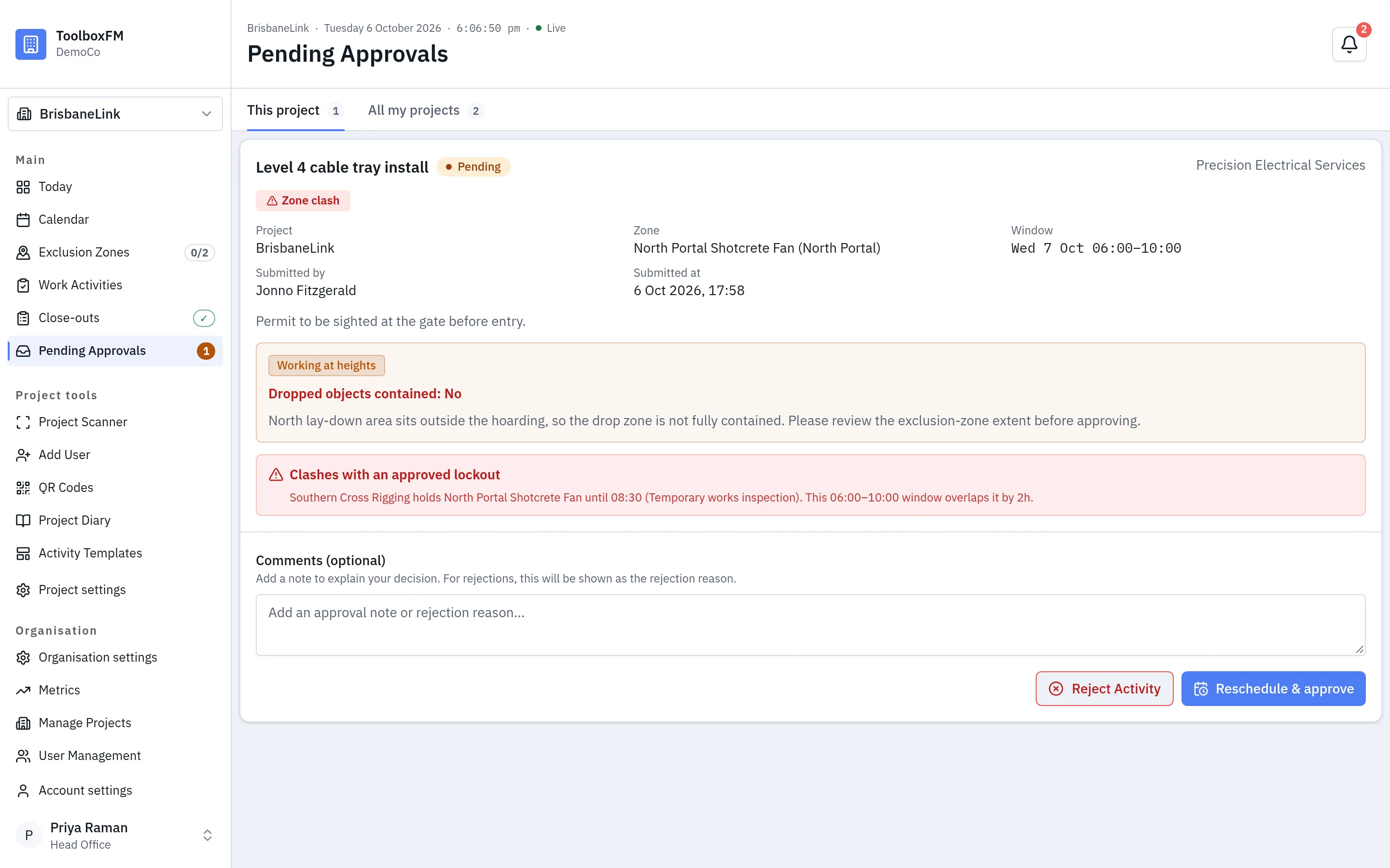 The approvals queue in ToolboxFM, showing a Working at heights request with Dropped objects contained: No, a comment and a clash with an approved lockout